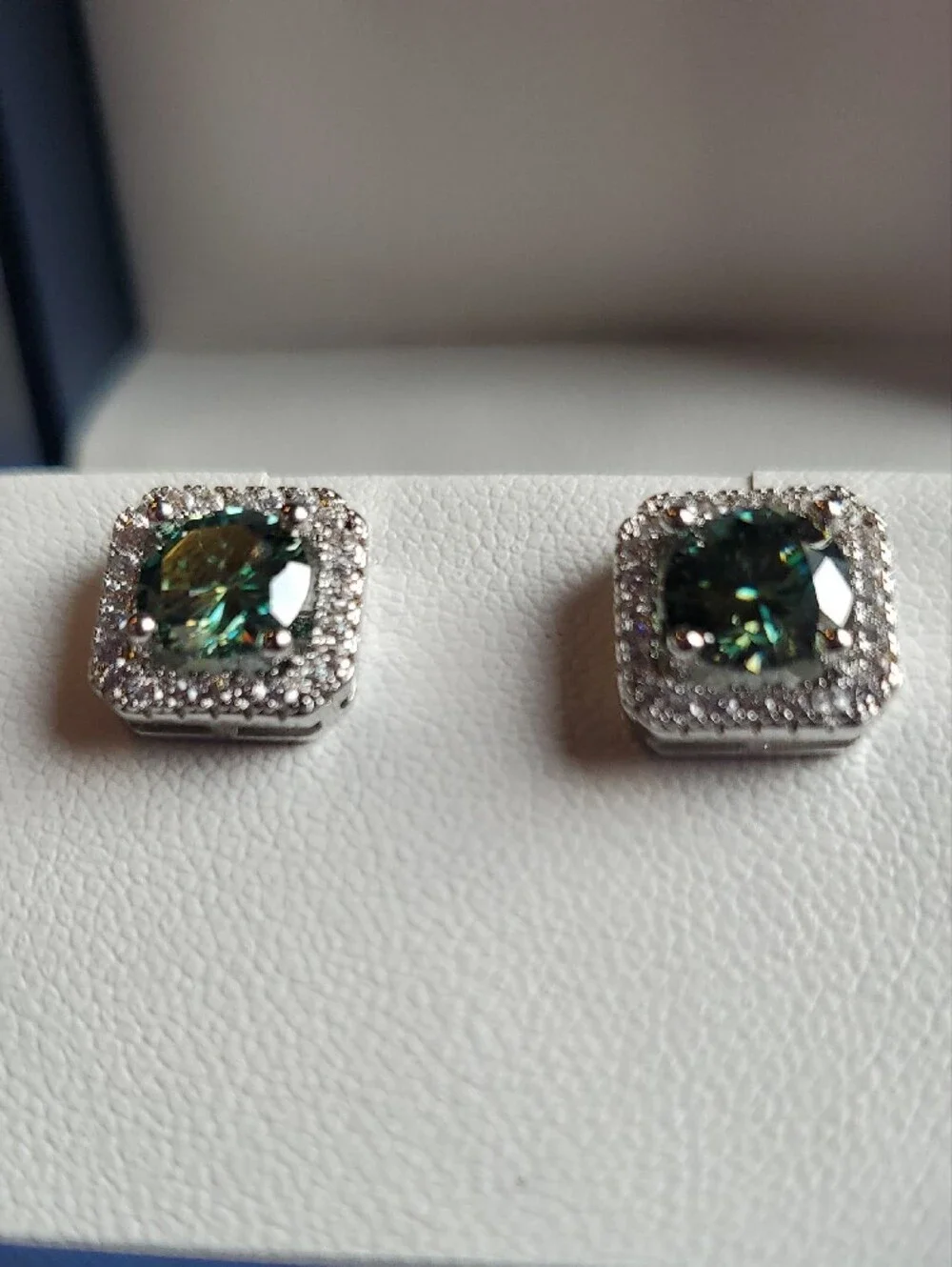 Silver Halo Stud Earrings with Teal Center Stone